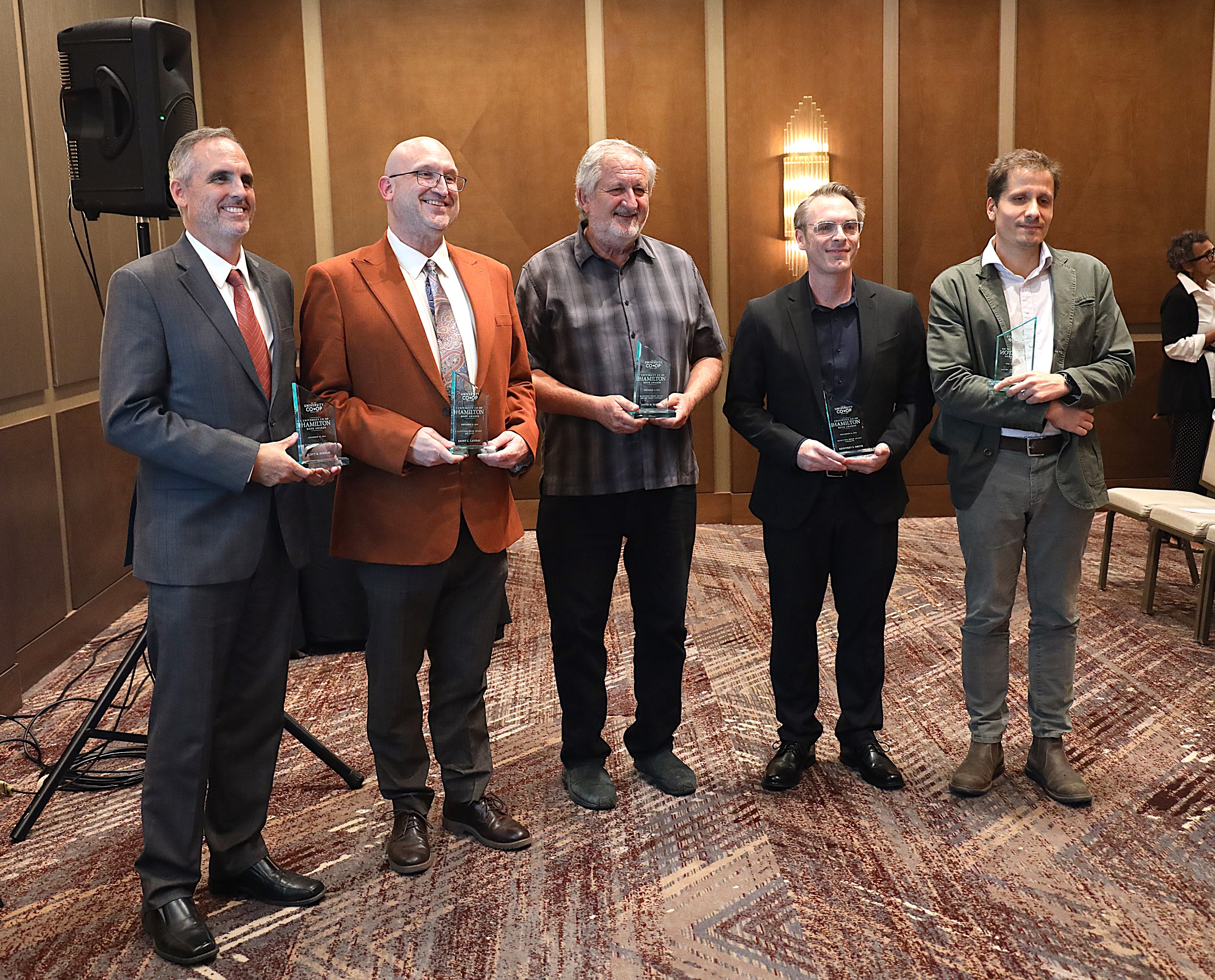 Recipients of the 2024 Hamilton Book Awards include, from left, Scott Stroud, Brent Landau, David Hillis, Geoffrey Smith and James Slotta.