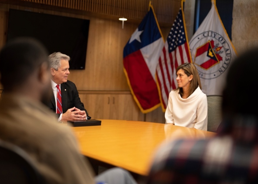 Photo of Meyers with Mayor Watson in Austin City Hall.