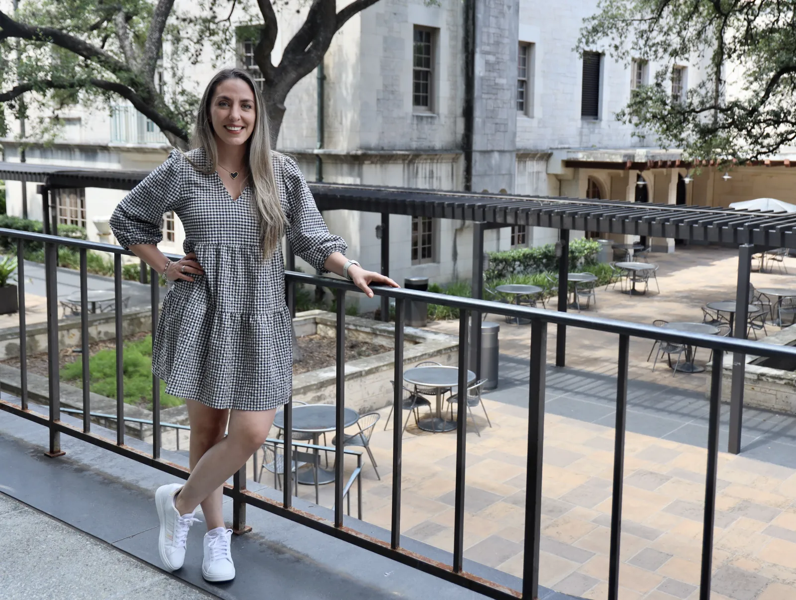 Karen Holguin Karen Holguin standing outside the Flawn Academic Center at UT Austin