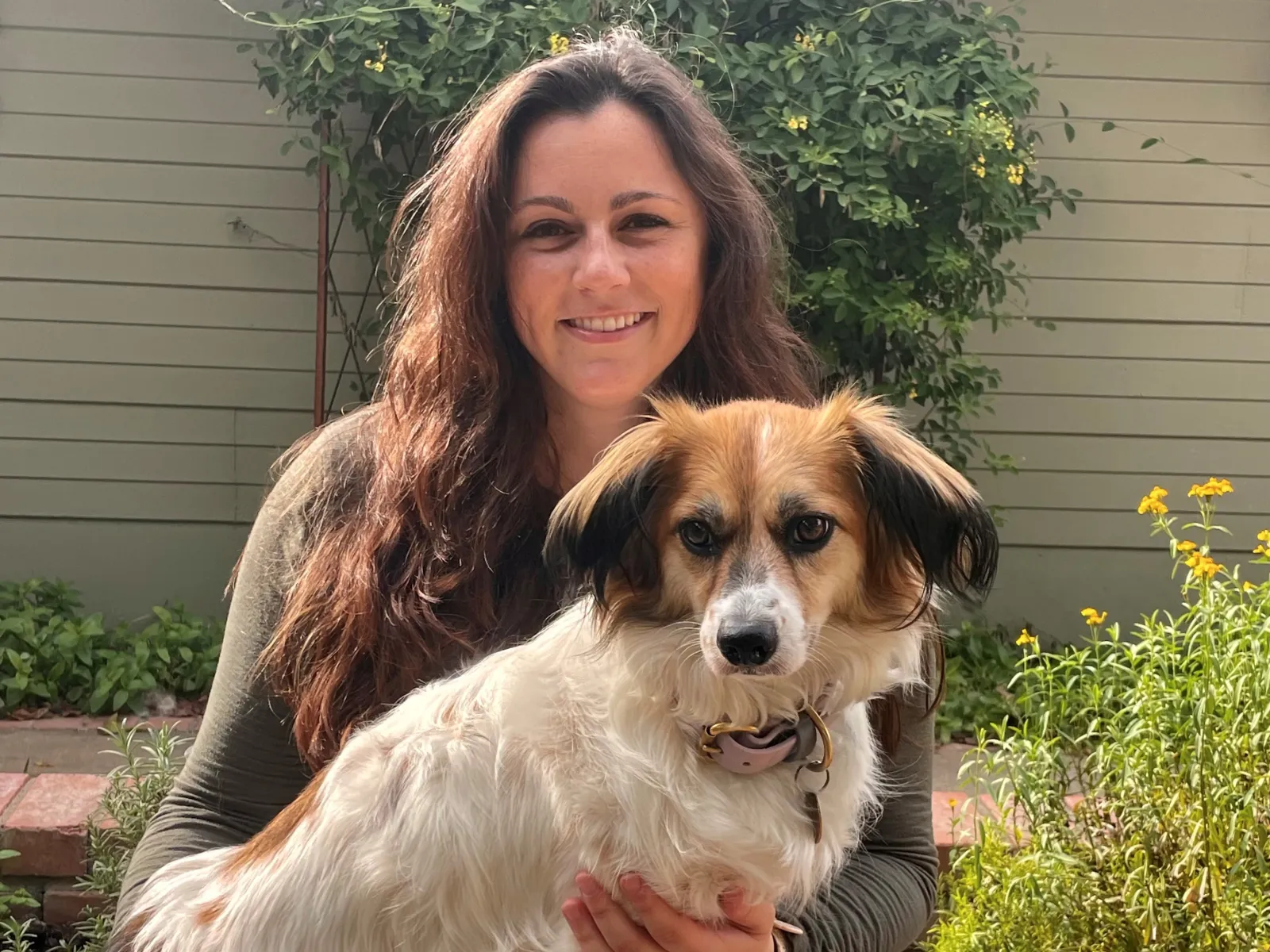 OVPR Senior Research Engagement Coordinator Meredith Chandler, with her dog Mabry OVPR Senior Research Engagement Coordinator Meredith Chandler, with her dog Mabry