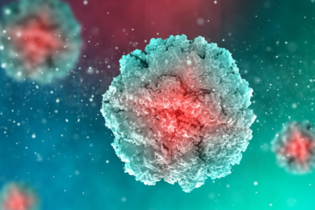 A close-up, detailed 3D rendering of a virus particle. The virus has a spherical shape with a textured surface, featuring spikes and ridges. The outer layer is predominantly teal, transitioning to a bright red core at the center. The background is a gradient of teal and red with other blurred virus particles in the distance, creating a sense of depth. Small white particles are scattered throughout the image, resembling floating debris or particles in space.