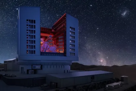 A nighttime exterior rendering of the Giant Magellan Telescope with support site buildings in the foreground.